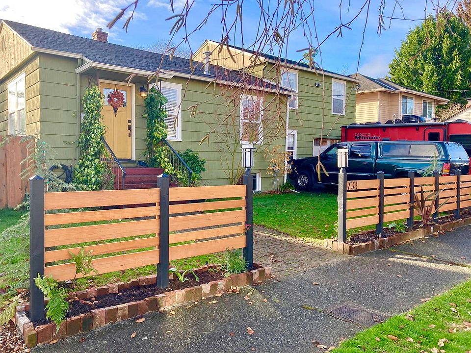 Two car driveway and a 500 square foot garage that opens from the front and back yard!