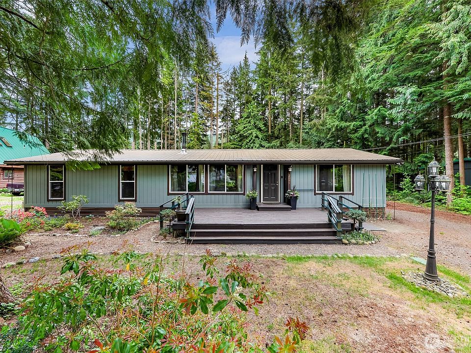 Set back from the road with a large front porch and room to enjoy the outdoors.>