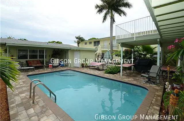 Excellent unit with private patio and community pool! Fast Move in — Photo 2