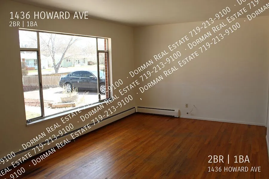 Charming 2-Bedroom Duplex with Hardwood Floors & Private Fenced Backyard — Photo 3