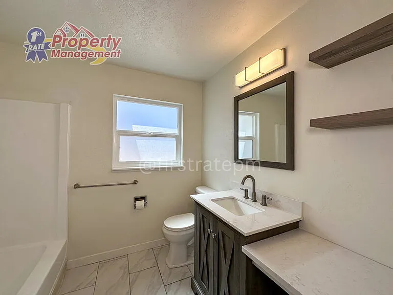 7703 S Mistyglen Ave — Photo 18