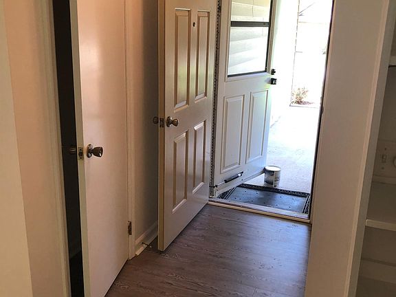 Entrance includes covered walkway.