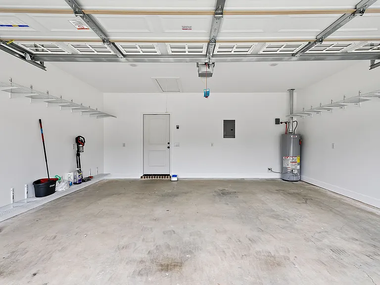 Two vehicle garage with built in storage