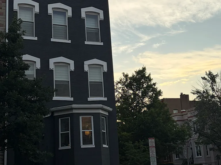 The top two floors, the six windows, three and three that you see, belong to the unit.