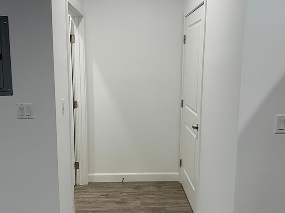 Storage and guest bathroom entrances