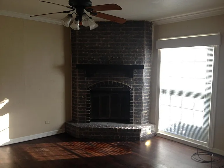 Wood burning fireplace in living room