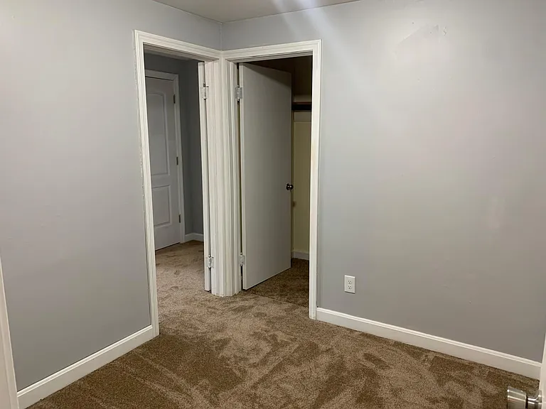 One bedroom or office area, connects to larger bedroom.