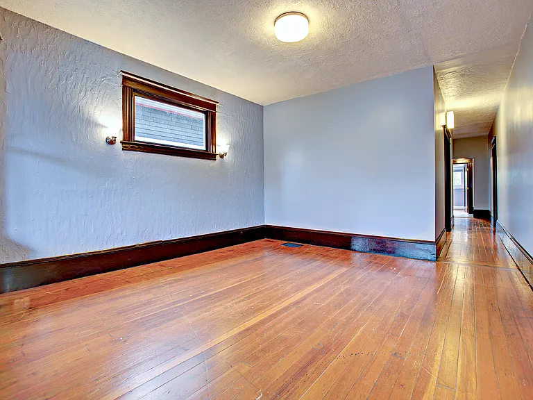 Living room with hallway to bedrooms