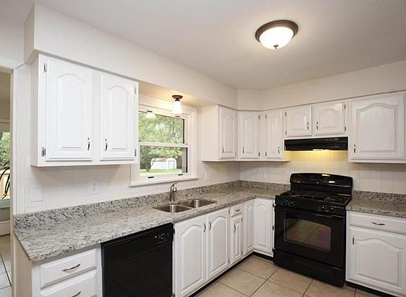 Updates kitchen with new granite and appliances