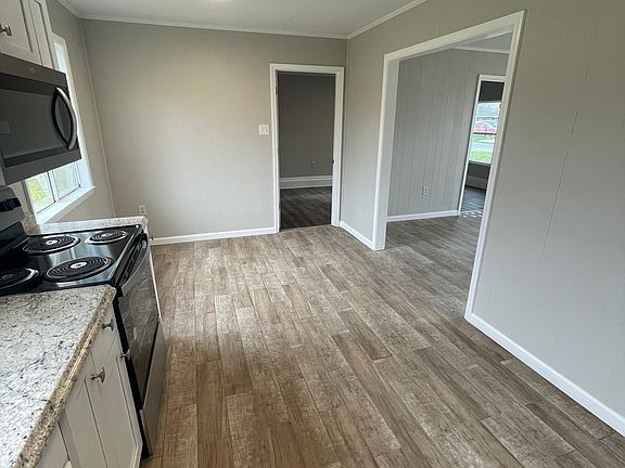 Kitchen with dining area to left