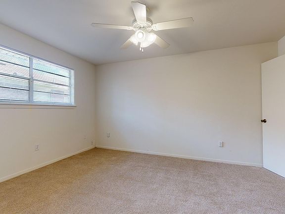 Spacious bedroom with large walk-in closet