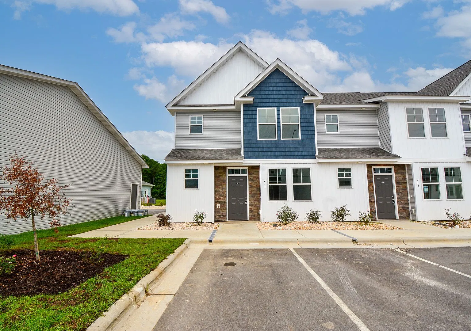 End Unit Townhome-Pond View-Detached Garage-First Floor Master — Photo 1