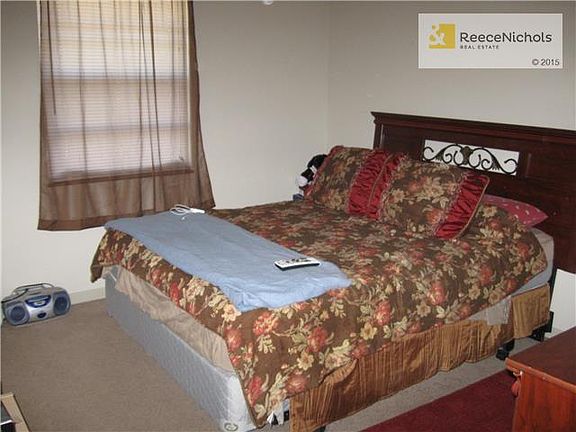 Bedroom large enough for larger furniture.