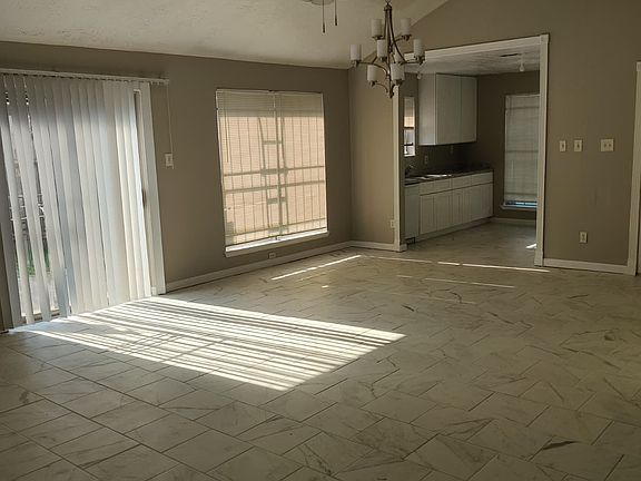Open Concept Living Room from the hallway perspective