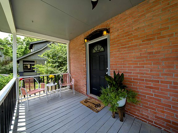 Sip & socialize on the front porch with ceiling fan.
