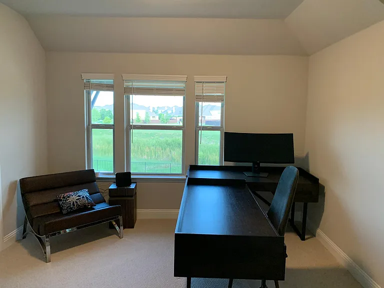 One of three upstairs bedrooms