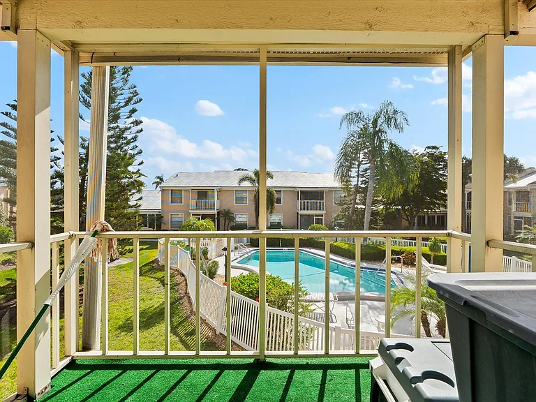 Private lanai with pool view.