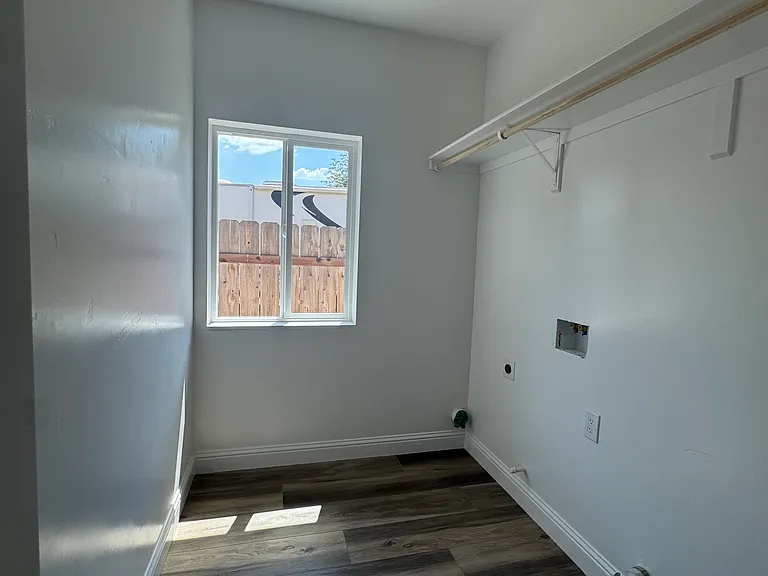 Interior laundry room with full hook-ups (both electrical and gas).