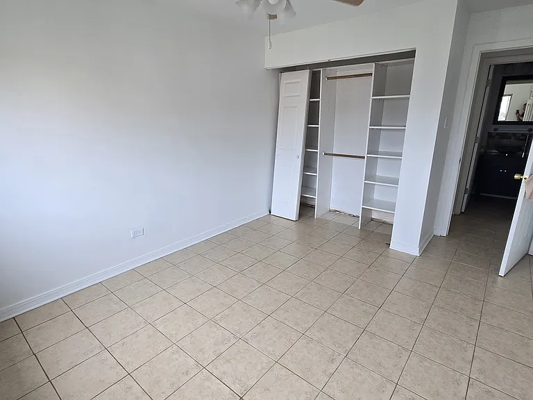 2nd Bedroom 10'0" x 11'5"