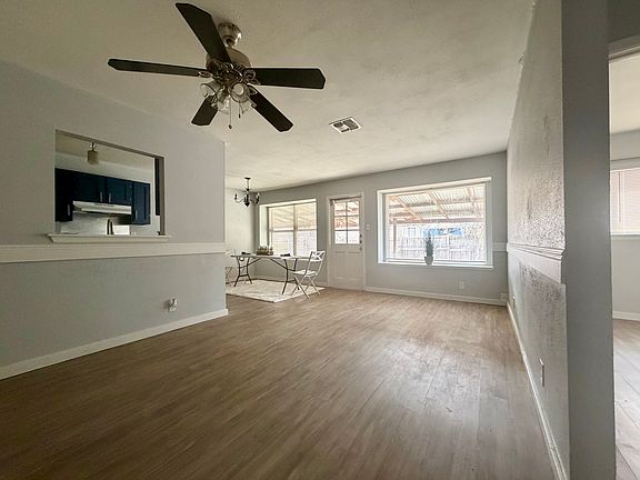 living room and view of dining room