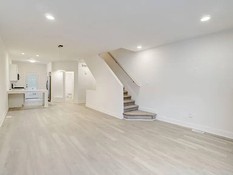 Luxury vinyl plank flooring throughout, 9' ceiling, recessed lights, spacious great room has lots of capacity for large groups