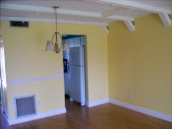 Dining room off the kitchen with accent ceiling