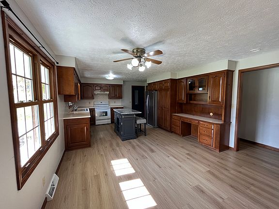 Spacious kitchen with desk area