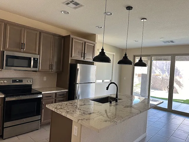 Kitchen and dining room - 865 Orion Ln