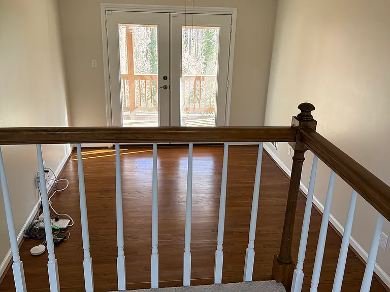 Dining room / Home office with french doors to rear deck - view from Living room.

Plus access to Kitchen, Family room, and Laundry room.