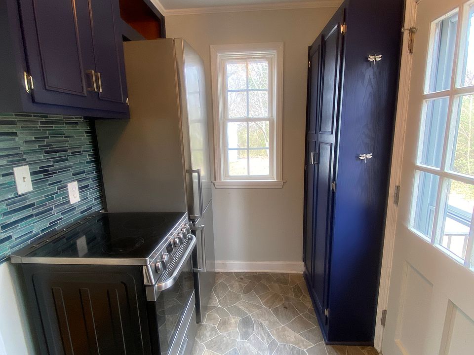 pantry, stove, huge refrigerator