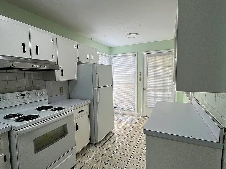 with old countertops, see other kitchen photo for updated/current