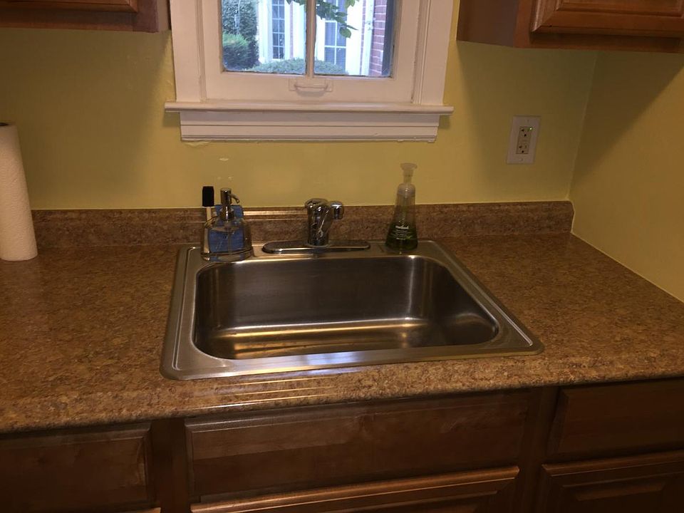 Kitchen sink, newer countertops & cabinets