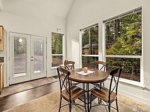 Warm neutral tones throughout that mimic mother natures' palette in this natural treed community.