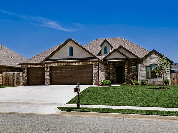 Warm & Inviting, this Mixed Brick & Stone Curb App