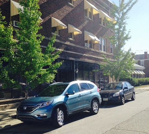 top floor apartment above printing company.