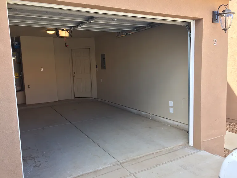 Single car garage with automatic opener.