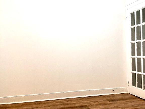 Breakfast Nook with Ceiling Fan and New Flooring, Freshly Painted