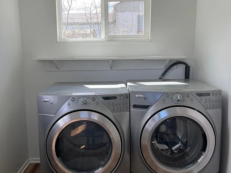 Laundry space with front-load washer and dryer