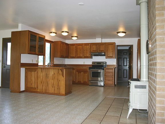 Open kitchen with custom cabinets