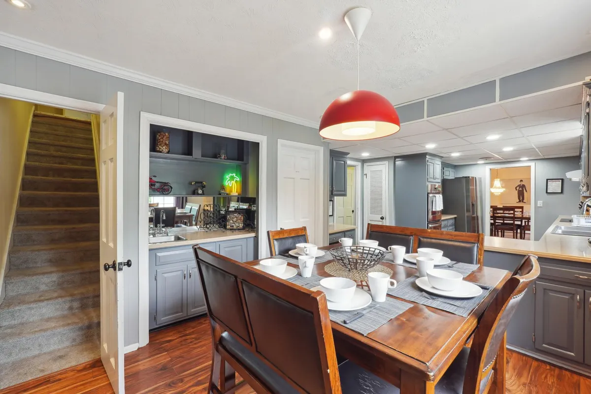 Eat-In Kitchen Area with Bar Area and staircase up to Master Bedroom -Main Level - 175 Highland Hills Rd