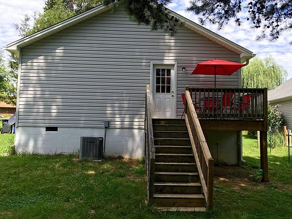 Three entrances with a patio deck off the master bedroom.