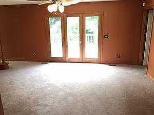 living room with doors to deck