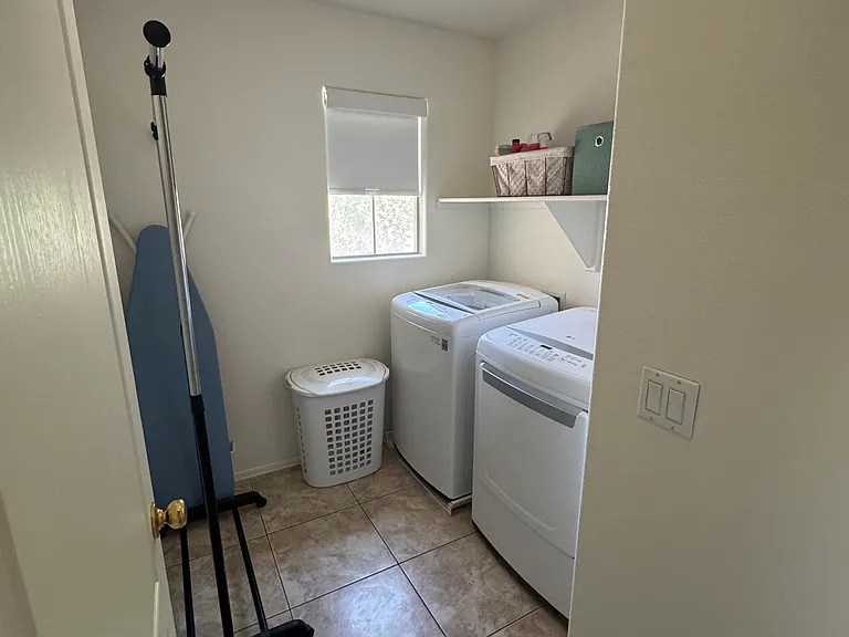 Upstairs laundry room with new washer & dryer