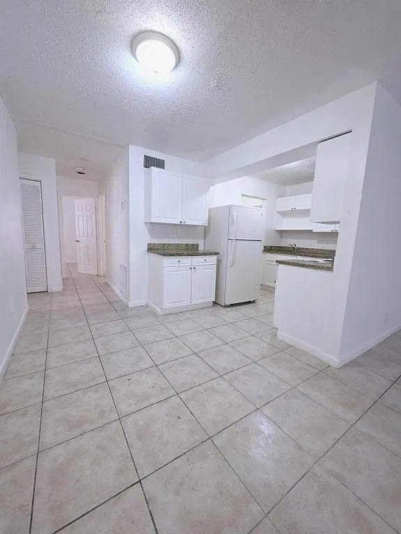 5631 NW 27th Ct — Photo 3