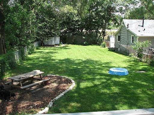 large, fenced backyard