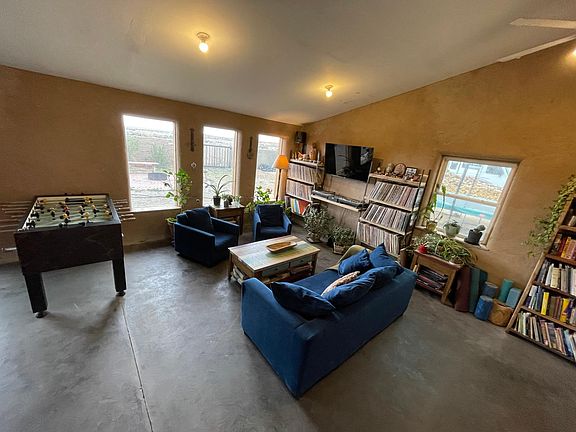 Living area with foosball table.