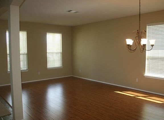 Formal living/dining area with nice laminate flooring