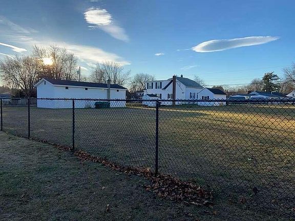 Fenced in yard behind house