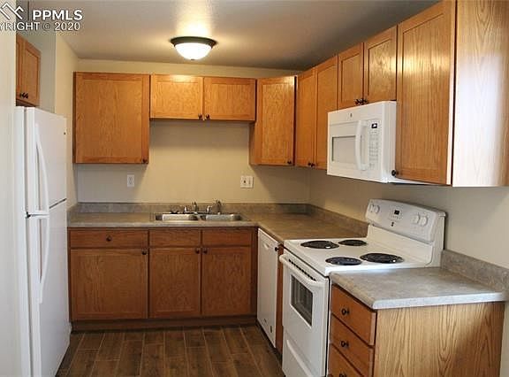 Kitchen with all new appliances, ceramic tile flooring and lighting!