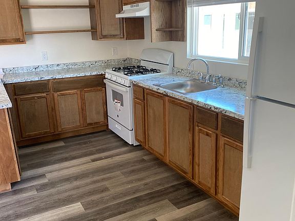 Kitchen with new appliances. Plenty of storage. Kitchen window is facing the owner's backyard.